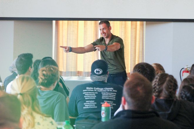 Joshua Kollmann speaking at an event